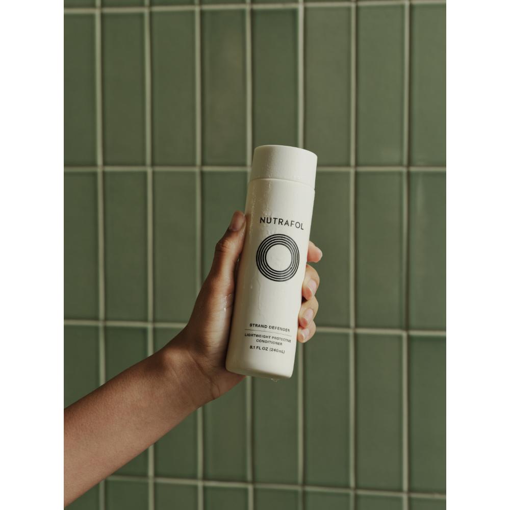 Nutrafol Strand Defender Lightweight Protective Conditioner (8.1 oz).
